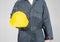 Close up Worker standing in blue coverall holding hardhat