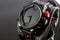 Close-up of wristwatch on a black background