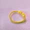 Close up of yellow Elastic hairband isolated on brown background