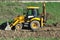 Close up yellow excavator tractor