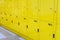 Close up on yellow lockers door at public locker service