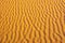 Close-up of yellow sand`s texture for background. Sand dune in Sahara  desert