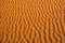 Close-up of yellow sand`s texture for background. Sand dune in Sahara  desert