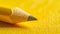 Close-up of Yellow Surface With Pencil