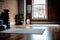 close-up of a yoga mat set up in the centre of an empty studio, with the studio\\\'s exposed brick walls (AIgen)