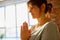 Close up of yogi woman meditating at yoga studio