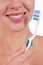 Close-up of a yougn woman smile with toothbrush