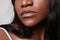 Close-up of young African American woman face. Mindset change. Isolated.