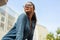 Close up of young attractive bespectacled woman looking aside.