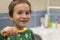 Close-up of young boy brushing teeth with toothbrush Portrait of healthy little boy enjoy cleaning his teeth with a happy face,