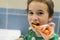 Close-up of young boy brushing teeth with toothbrush Portrait of healthy little boy enjoy cleaning his teeth with a happy face,