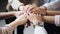 Close up of young business people putting their hands together. Stack of hands. Unity, particication, teamwork, support, and