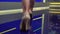 CLOSE UP: Young businesswoman tv presenter walking in high heels