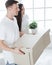 close up. a young couple with boxes in a new apartment.