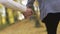 Close-up of young couple clasping hands in slow motion, romantic relationship