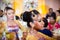 Close up of young female dancer in tradtional costume at wedding in Colombo, Sri Lanka