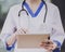 Close up. Young Female Doctor with Stethoscope.