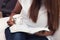 Close Up Of Young Lady Studying Her Bible