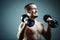 Close up of young man lifting weights