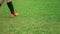 Close-up of young soccer player taking a penalty kick