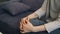 Close-up of young woman moving hands expressing anxiety and nervous strain