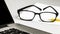 Close-ups on glasses on laptop