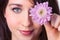 Close-ups portrait pretty girl with lilac flower chrysanthemum