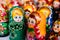 Close Varicoloured Matryoshka, Russian Nesting Dolls, Famous Old Wooden Souvenir At Shop Showcase