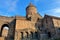 Close view of 9th-century Armenian Apostolic Tatev monastery in Armenia. Tree and mountains at the background in autumn

ï¿¼