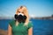 Close view: Beautiful blonde woman respirator face mask