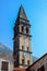 Close view of the belltower in mediterranean town