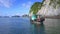 Close View Blonde Girl in Swimsuit Sits on Boat Sailing in Bay