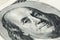 A close view of boring portrait of Ben Franklin of old one hundred us dollars banknote