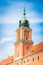 Close view of the Clock tower of The Royal Castle in the old town city center of Warsaw, Poland