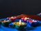 A close view of Colourful diyas placed on a blue plate to celebrate diwali