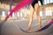 Close view of female gymnast legs on gym