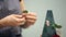 Close view of florist making flower composition inside office