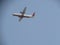 Close view of flying commercial Aeroplane from sea shore of Beach.