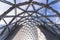 close view of glass domed steel structured window from below