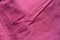 Close view of jammed reddish rose fabric