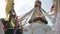 A close view of a nepalese monkey temple, swayambhunath stupa. Nepal Kathmandu. Prayer flags. View from below.