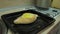 Close view professional cook breaks egg into khachapuri hole