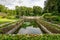 Close view of the rectangular pond of the Plas Cadnant formal g