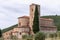Close view of San Antimo abbey Abbazia di Sant`Antimo, a combination of different architectural styles and eras