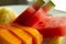 Close View of slices of Papaya, Watermelon and Pineapple