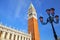 Close view of St Mark`s Campanile and Biblioteca at Piazzetta Sa