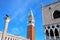 Close view of St Mark`s Campanile, Lion of Venice statue and Palazzo Ducale at Piazzetta San Marco in Venice, Italy