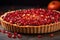 close view of a tart with vibrant pomegranate seeds