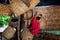 Close view of various wicker baskets and a red plastic bag