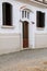 Close view of white colonial house in historic quarter of Colonia del Sacramento, Uruguay.